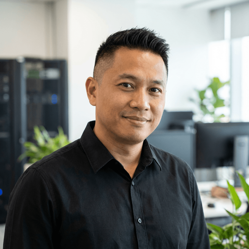 Marcus Chen in a modern office with neutral paint tones